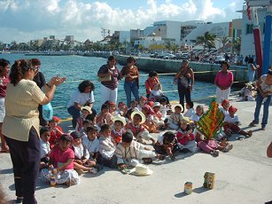 Mexican kids singing Christmas songs in Cozumel.
